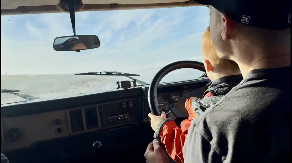 View from inside the cab driving on the beach