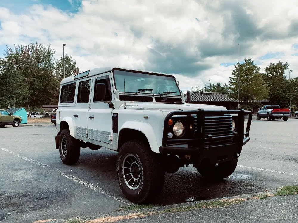 Perentie 110 front three-quarter view in a parking lot