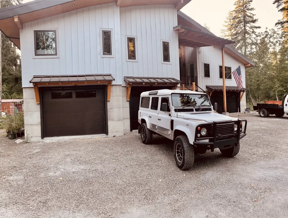 Perentie 110 parked in front of house