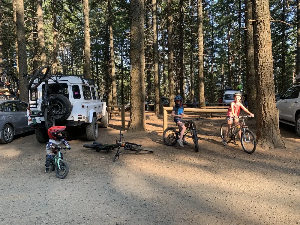 Family bike ride at campsite with the Perentie 110