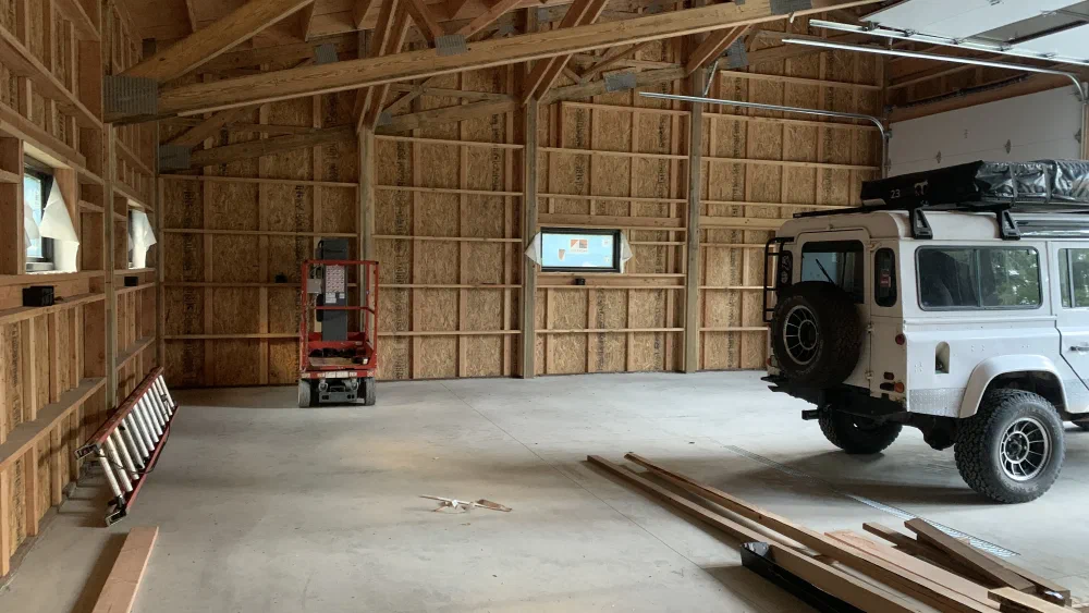 Perentie 110 parked inside a large workshop